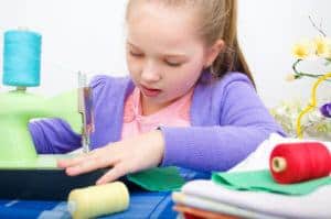 Girl sewing